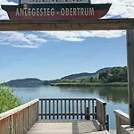 Exklusives Seehaus Lakehouse In Bestlage Mit Privaten Sandstrand Und Eigenem Boot Und Sup