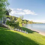 Casa vacanze Exklusives Seehaus Lakehouse In Bestlage Mit Privaten Sandstrand Und Eigenem Boot Und Sup *
