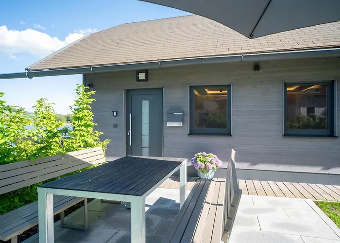 Exklusives Seehaus Lakehouse In Bestlage Mit Privaten Sandstrand Und Eigenem Boot Und Sup